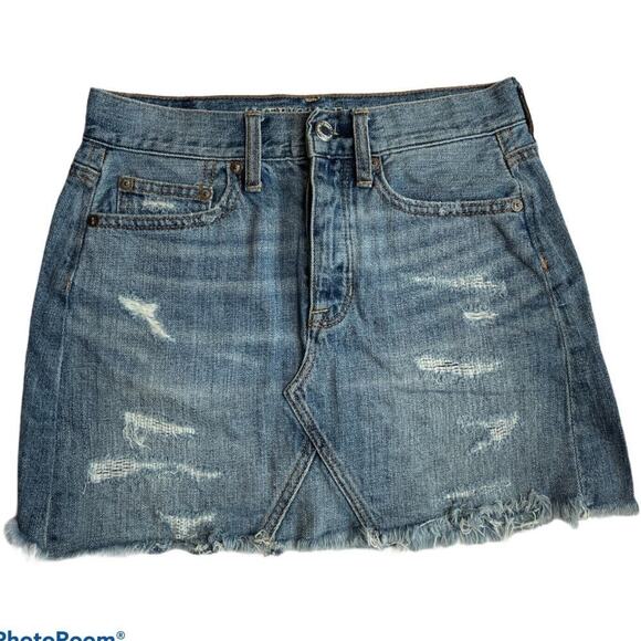 American Eagle Blue Denim Button Fly Distressed Raw Hem Mini Skirt Women's Sz 0 - Picture 1 of 6